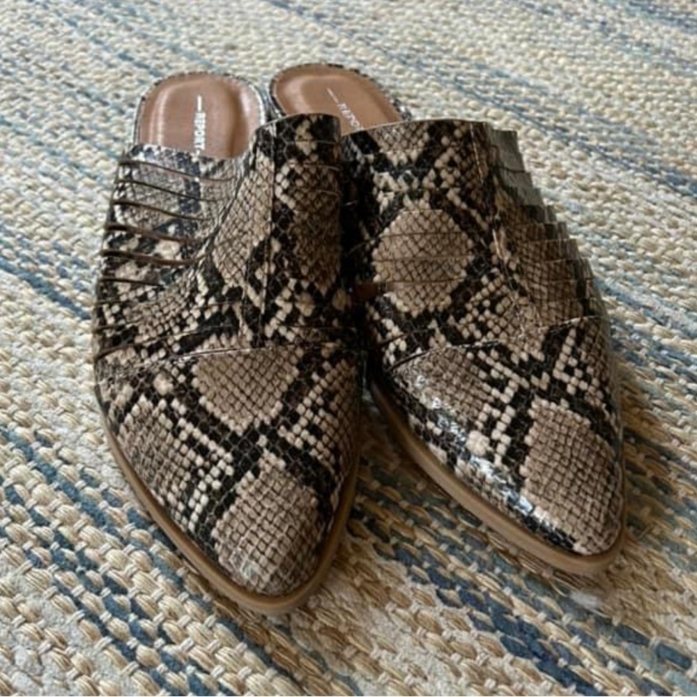 Report flats…mules snake print.